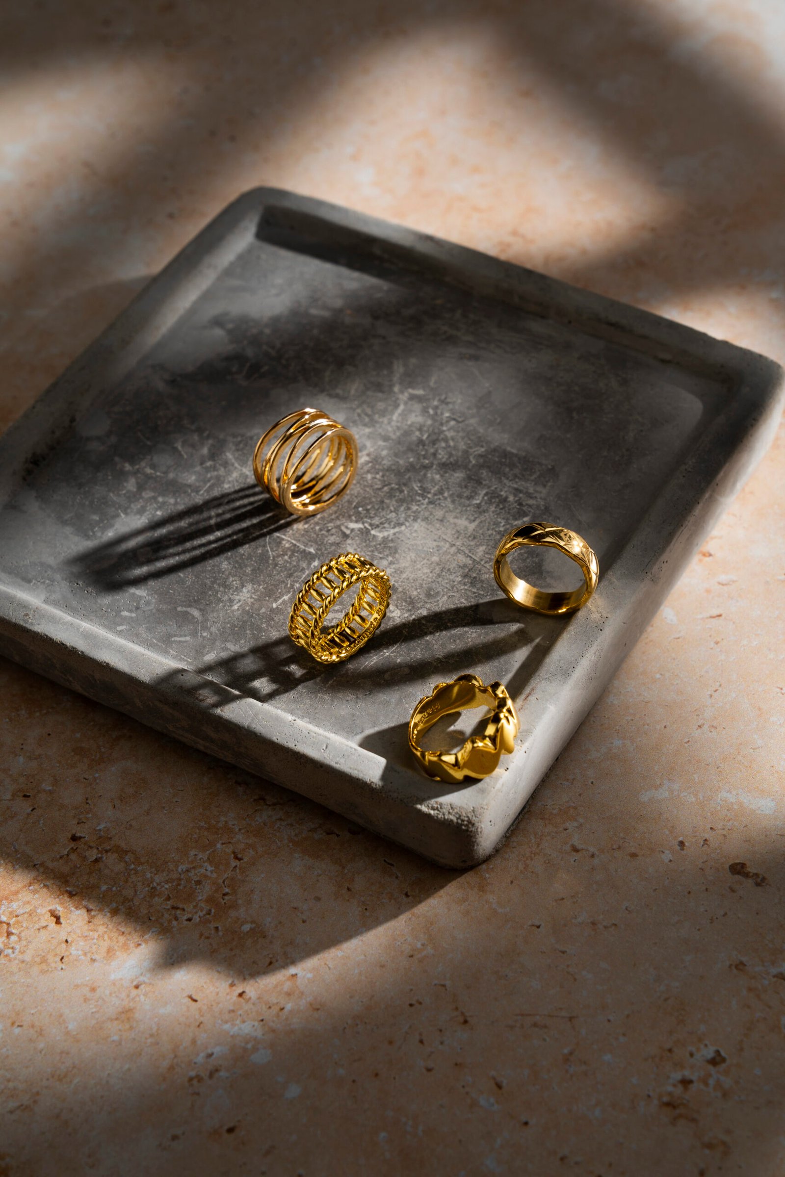 view-luxurious-golden-ring-rock-concrete-tray